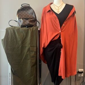 Brand new short sleeve burnt, orange, collared shirt, cleats, natural buttons